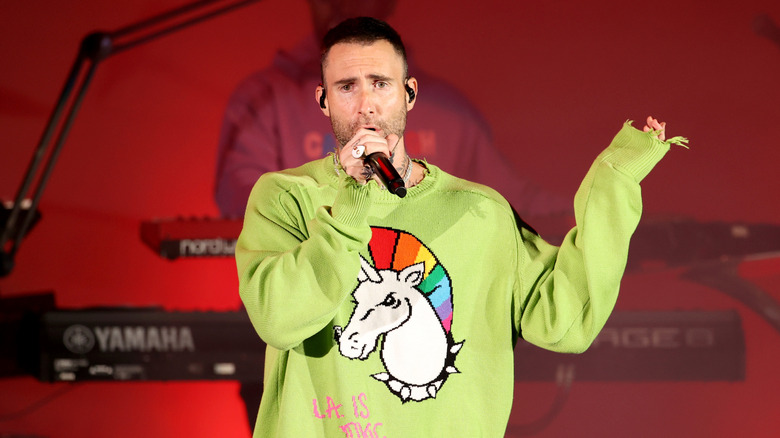 Adam Levine performing