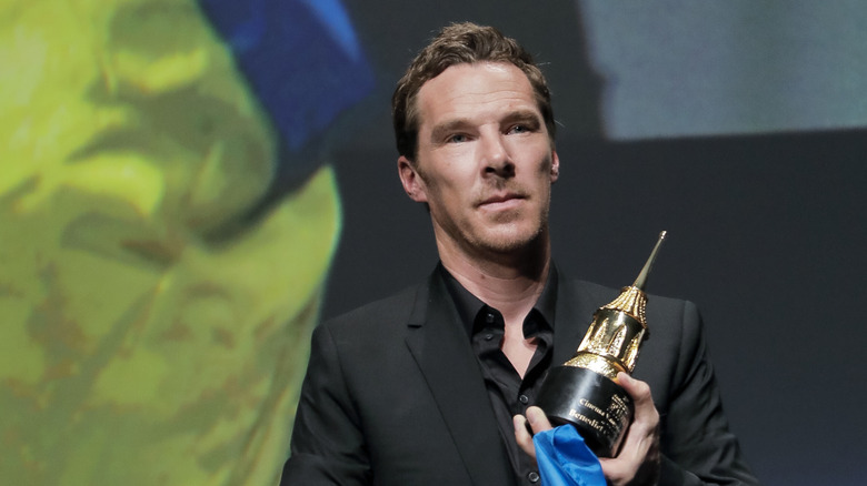 Benedict Cumberbatch holding an award