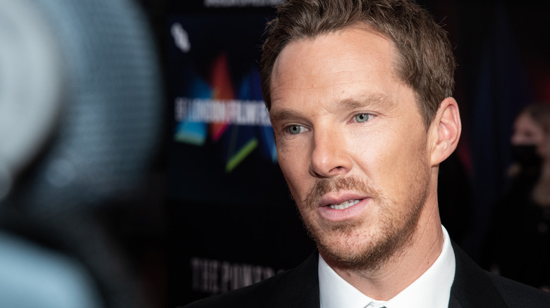 Benedict Cumberbatch looking down and away