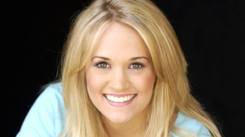 Carrie Underwood smiling in promotional photos.