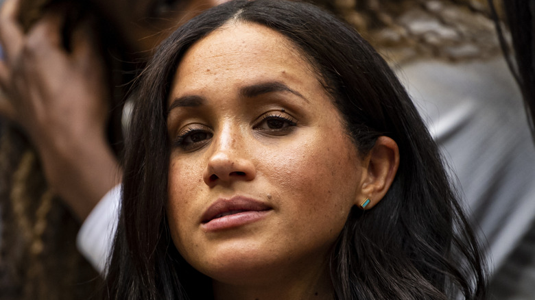 Meghan Markle watching a tennis match