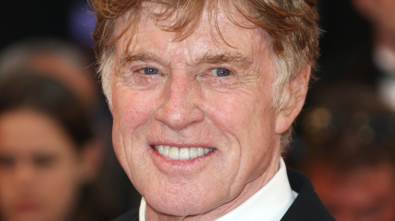 Robert Redford smiling and looking to the side
