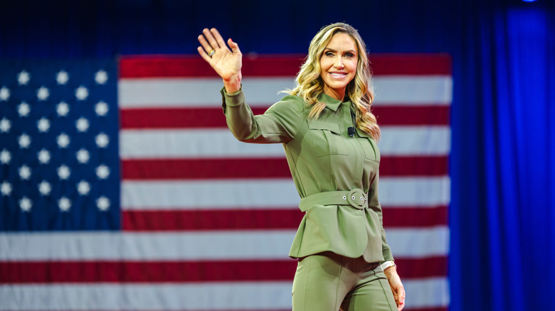 Lara Trump waving in olive green pantsuit