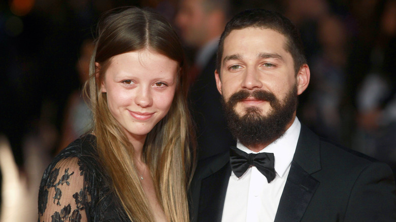 Mia Goth and LaBeouf smiling together