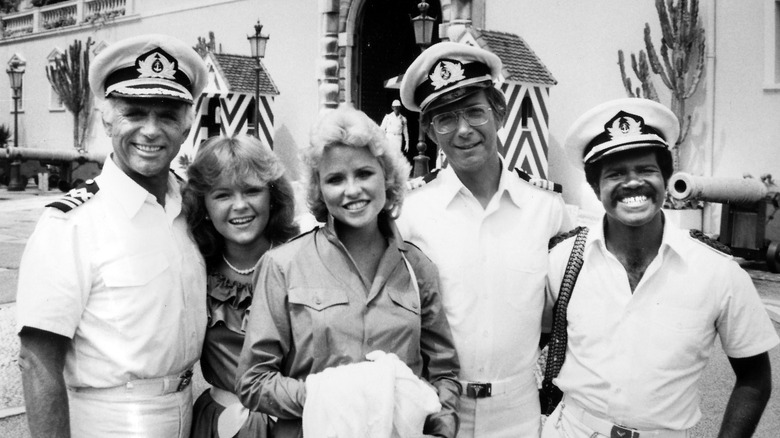 Black and white photo of cast members of 