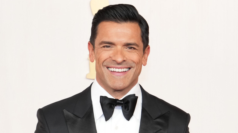 Mark Consuelos smiles in a bowtie at the 2024 Oscars.