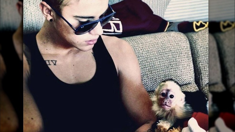 Justin Bieber with monkey