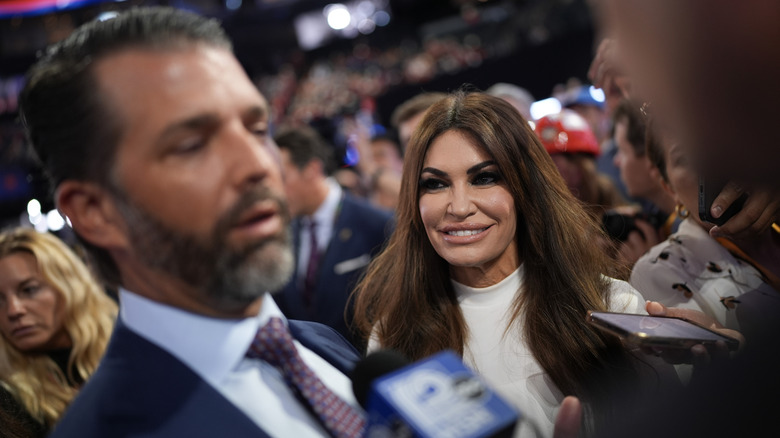 Kimberly Guilfoyle looking at Donald Trump Jr